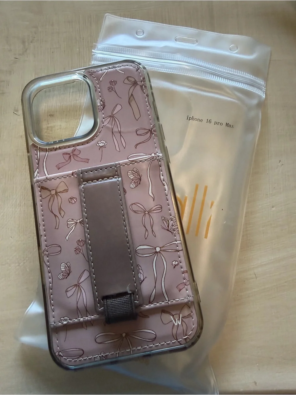 Pink Floral Wallet Phone Case with Hand Strap for iPhone 16 Pro Max